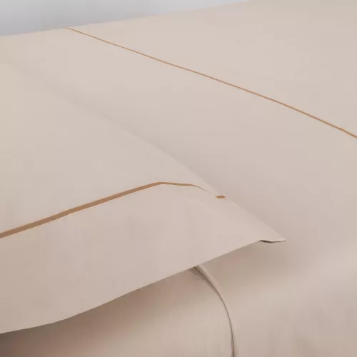 Juego de sábanas de Manterol, modelo Trend en color beige con franja en color arcilla. Medidas para cama de 180
